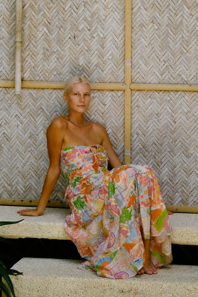 Photo of blonde model wearing the PRANELLA Spring/Summer 2024 Rocky Picnic Maxi Dress.